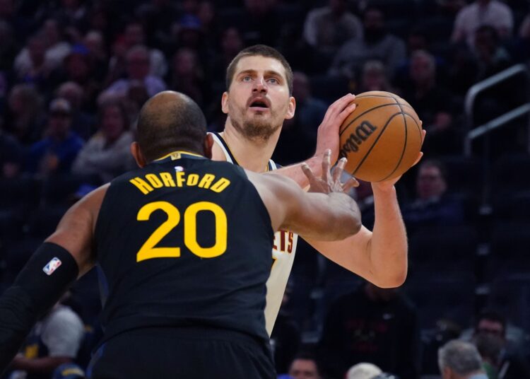 Al Horford et Nikola Jokic